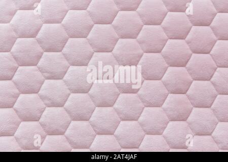 Pink color hexagon mesh fabric textured background Stock Photo