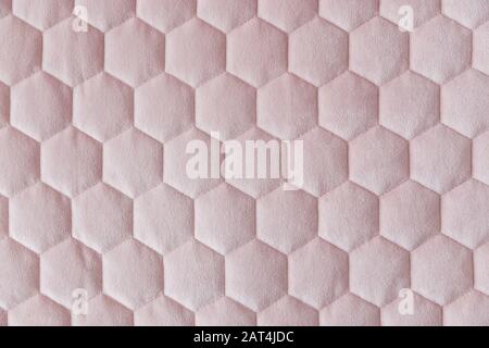 Pink color hexagon mesh fabric textured background Stock Photo
