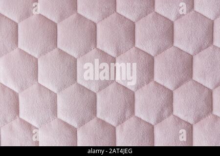 Pink color hexagon mesh fabric textured background Stock Photo