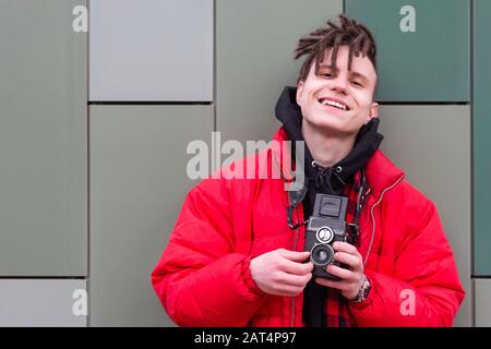 portrait of photographer took shot and smile happy fashionable Stock Photo