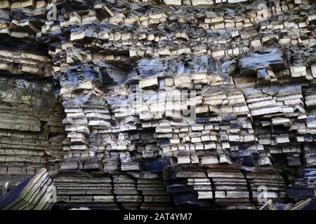 Blue Lias limestone and shale rock strata in cliffs at Lavernock Point, South Glamorgan, Wales, UK Stock Photo