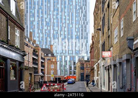Contrasting style of old and modern architecture  on Brune Street Whitechapel East London England UK Stock Photo
