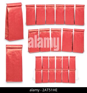 Front view of set of blank red paper bags for tea or coffee packaging. Retail shopping and advertising concept. Isolated on a white background. Stock Photo