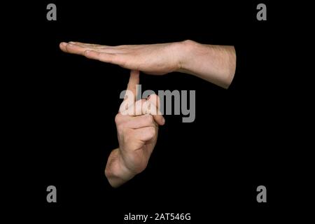 The word DEPRESSION in British sign language on an isolated black background Stock Photo