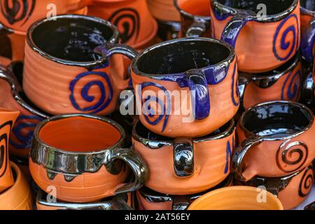 Handmade clay tea cups on display for sale at a handicraft fare at Kolkata, India Stock Photo