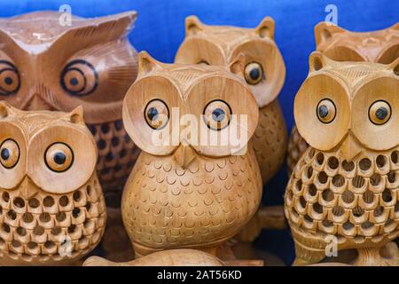 Handmade wooden owls on display for sale at the Handicraft fair at Kolkata Stock Photo