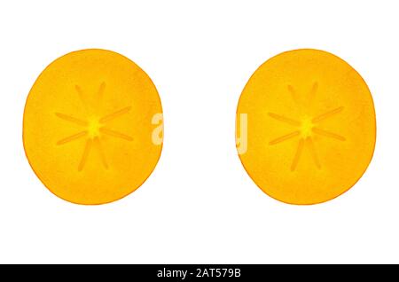 The juicy orange fruit sharon lies cut on a white background. Stock Photo