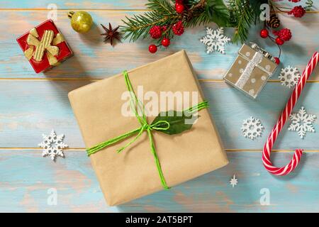 Xmas holiday 2020. New Year or Christmas presents wrapped ribbon flat lay. Celebration handmade gift boxes. Top view flat lay. Stock Photo