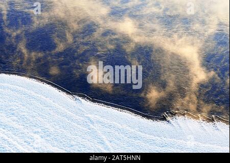 River water freezing on a very cold winter day Stock Photo