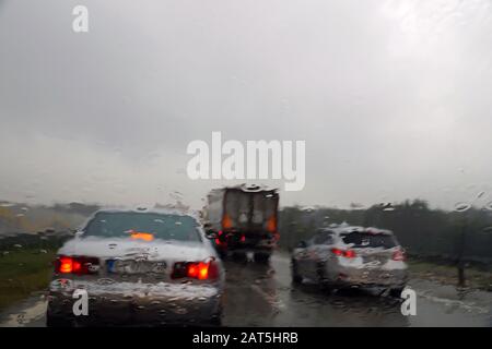 Picture from inside a moving car.  Sad, rainy weather. Stock Photo