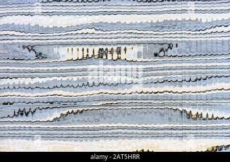 Gray wavy wood texture. Wooden background for design and decoration. Stock Photo