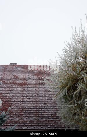 roof in the countryside covered with frost Stock Photo