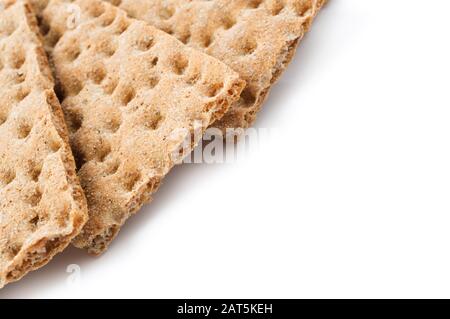 Crunchy crispbread on white background. Stock Photo