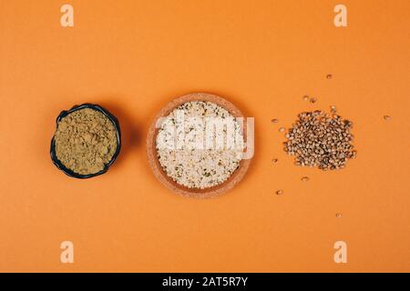 Different types of uses for hemp. Seeds, protein and powder. Flat lay style. Stock Photo