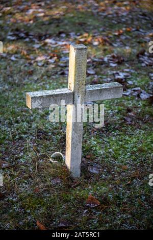 Anonymous wooden cross on grave in a cemetery Stock Photo