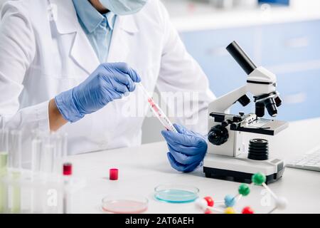 cropped view of genetic consultant doing dna test in lab Stock Photo