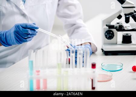 cropped view of genetic consultant doing dna test in lab Stock Photo
