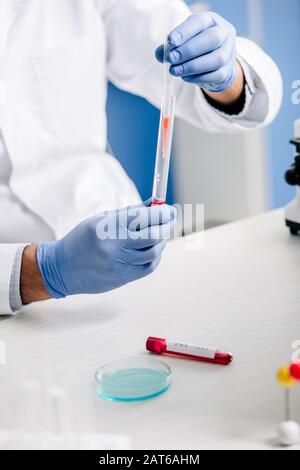 cropped view of genetic consultant doing dna test in lab Stock Photo
