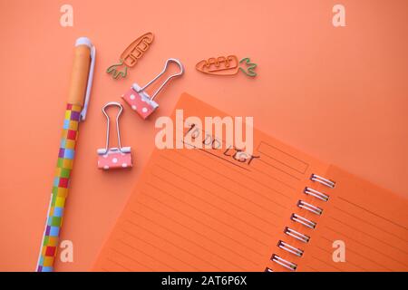 To do list on notepad with pen on desk Stock Photo