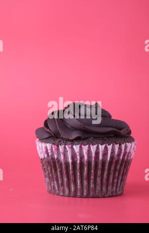 Close up of cup cake on red background Stock Photo