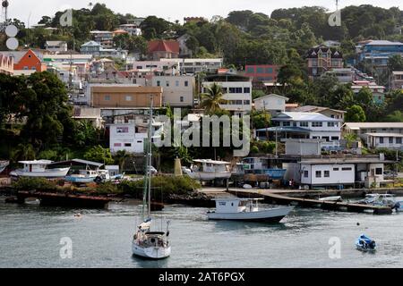 Houses on the waterfront, Scarborough, Tobago, Trinidad and Tobago Stock Photo