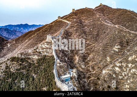 Beautiful winter aerial drone view of Great Wall of China Mutianyu section near Bejing. Stock Photo