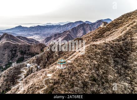 Beautiful winter aerial drone view of Great Wall of China Mutianyu section near Bejing. Stock Photo