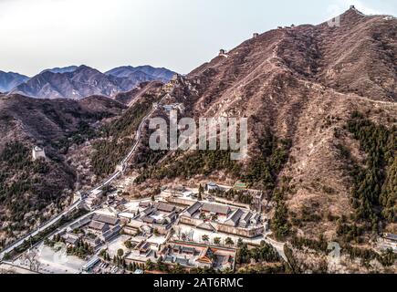 Beautiful winter aerial drone view of Great Wall of China Mutianyu section near Bejing. Stock Photo