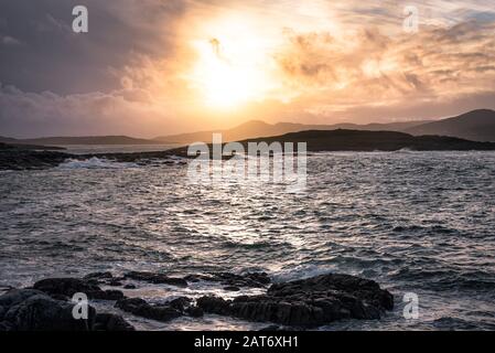 Sun going down on the coast of County Donegal in Ireland Stock Photo