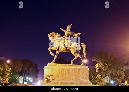 Statue of Tamerlane in Tashkent at night Stock Photo