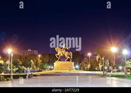 Statue of Tamerlane in Tashkent at night Stock Photo