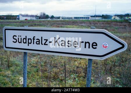 Germersheim, Germany. 31st Jan, 2020. A sign with the inscription 'Südpfalz-Kaserne' is located on a field in front of the area of the Südpfalz-Kaserne. The German government is planning the return flight of the Bundeswehr for Germans and their relatives from the Chinese province of Hubei, which is most severely affected by the coronavirus. The returnees will be accommodated centrally at the Germersheim airbase in Rhineland-Palatinate. Credit: Uwe Anspach/dpa/Alamy Live News Stock Photo