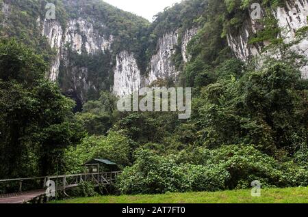 Entrance to Deer Cave situated in a rock massif consisting of Melinau limestone, Gunung Mulu National Park, Sarawak, Borneo, Malaysia Stock Photo