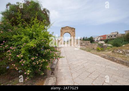 The arch of triumph and the Byzantine road. Roman remains in Tyre. Tyre is an ancient Phoenician city. Tyre, Lebanon - June, 2019