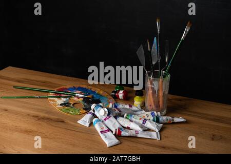 Artist's Palette With Brushes an Paints Stock Photo