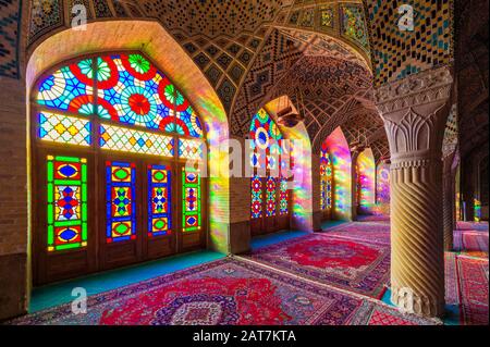 Nasir-ol-Molk Mosque, Light patterns from colored stained glass illuminating the iwan, Shiraz, Fars Province, Iran Stock Photo