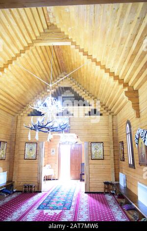 interior of a wooden church in Romania Stock Photo