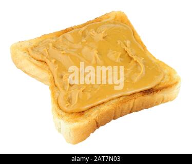 Peanut butter spread on a slice of toasted bread isolated on a white background Stock Photo