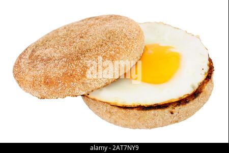 Fried egg on a soft toasted wholemeal English muffin isolated on a white background Stock Photo
