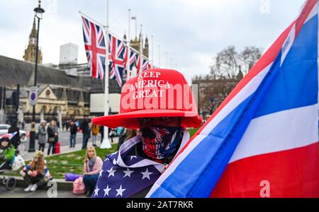 London UK 31st January 2020 - A pro Brexit and Keep America Great supporter ion Parliament Square London as Britain prepares to leave the EU at 11pm later this evening 47 years after joining : Credit Simon Dack / Alamy Live News