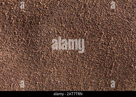 Background macro texture of suede brown leather. Stock Photo