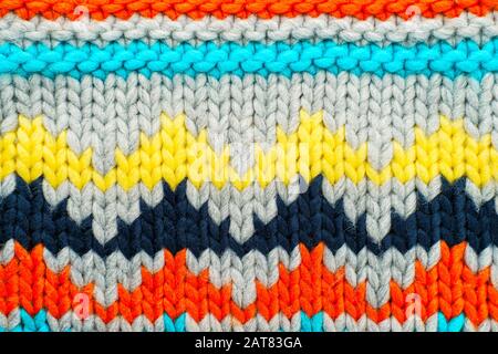 Handmade knitted multi-colored pattern. Hobby background Stock Photo