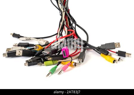 Close-up shot of bundle of various colored cables with various connectors suitable for different ports. Stock Photo