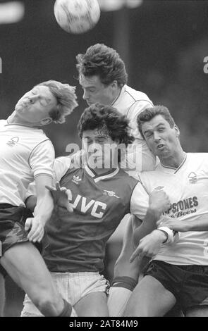 Niall Quinn is out-gunned as he tries to head for goal. Pearce, Gaynor and Foster are the Nottingham Forest players, left - right. No one can watch Stock Photo