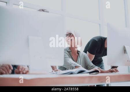 close up. a group of web designers working on new sketches. Stock Photo
