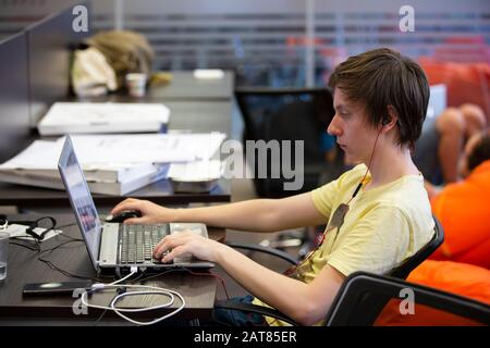 Belarus Minsk 06 August 2016 The Park of High Technologies. Competitions programmers.The man is working at the computer. The programmer writes a progr Stock Photo