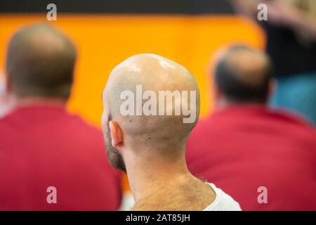 Belarus, the city of Minsk. Programmers Office. The bald head of a man. Stock Photo