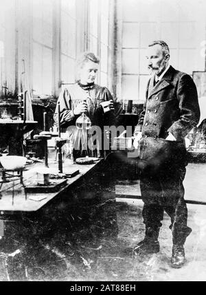 Pierre and Marie Curie in their laboratory, photograph circa 1900 Stock Photo