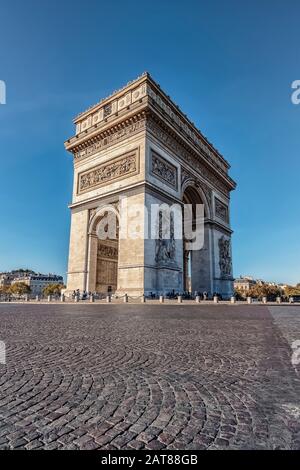 Arc De Triomphe in Paris in daytime Arc De Triomphe in Paris in daytime