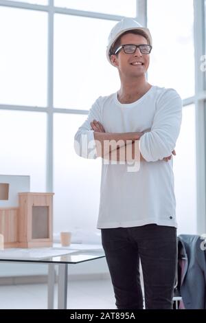 young dreaming architect through his office window Stock Photo